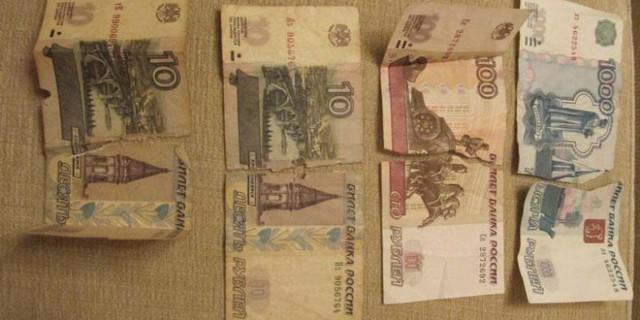 Ветхие доллары и евро: как обменять поврежденные банкноты